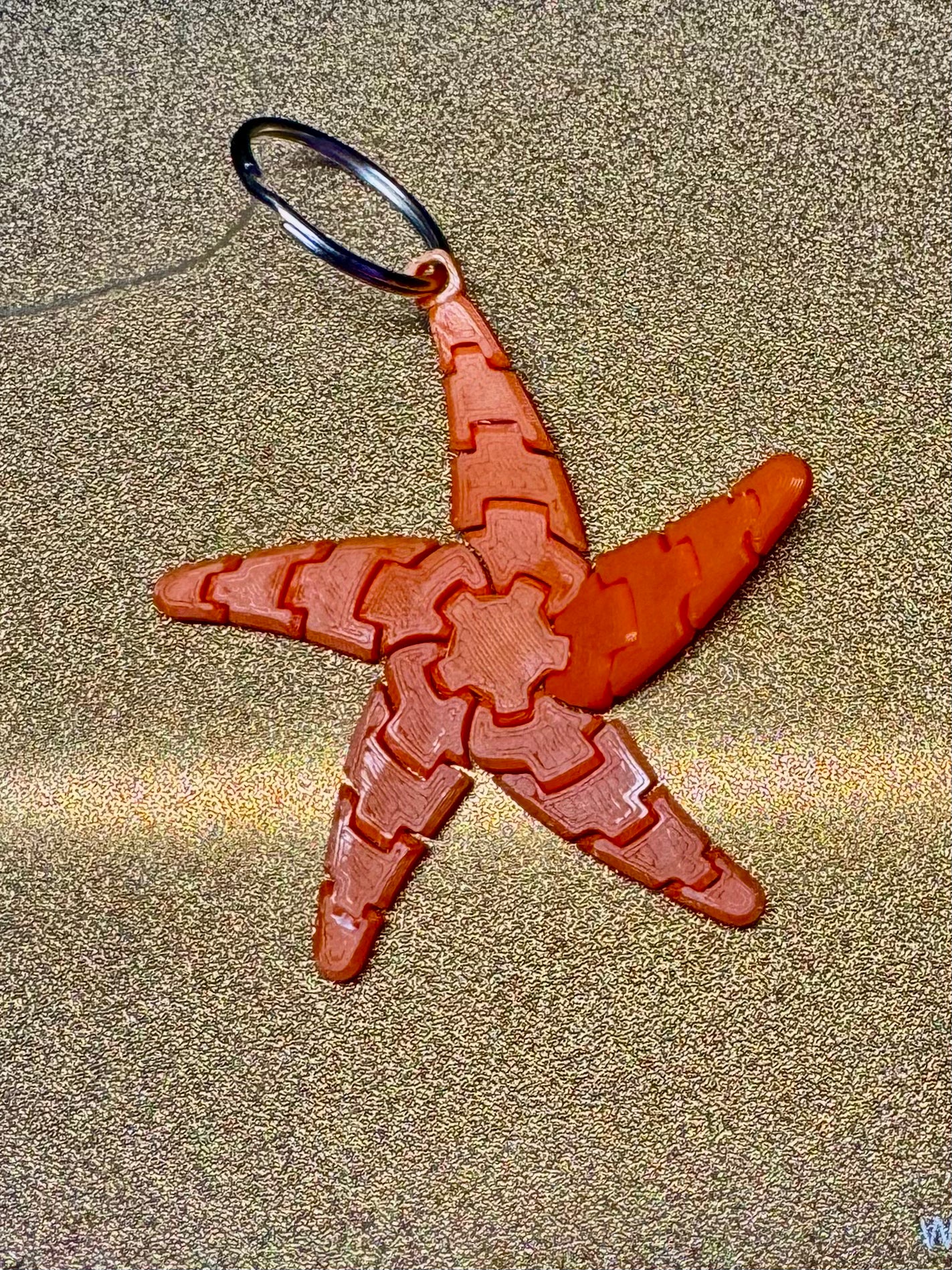 Flexi starfish keychain