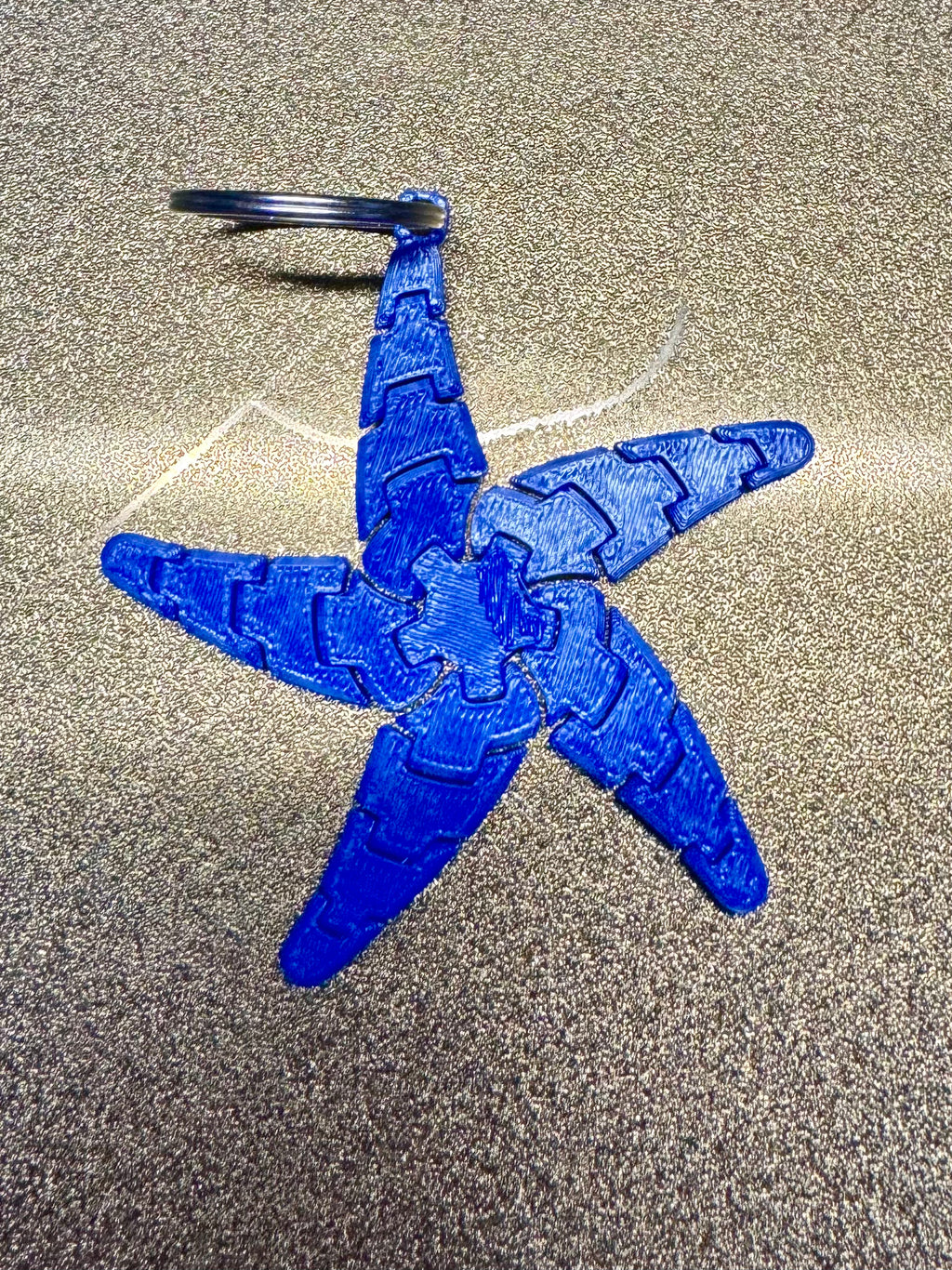 Flexi starfish keychain